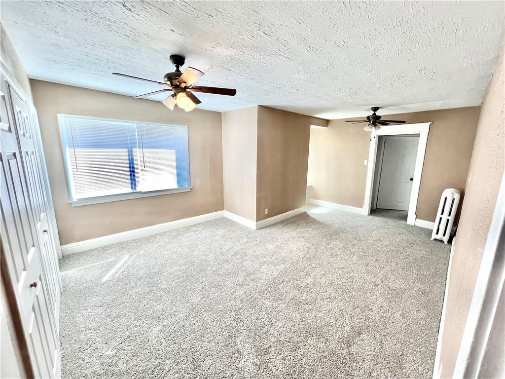 1032 Main Street Republic, PA 15475 - Photo 18 of 39 wooden floor in an empty room with a window