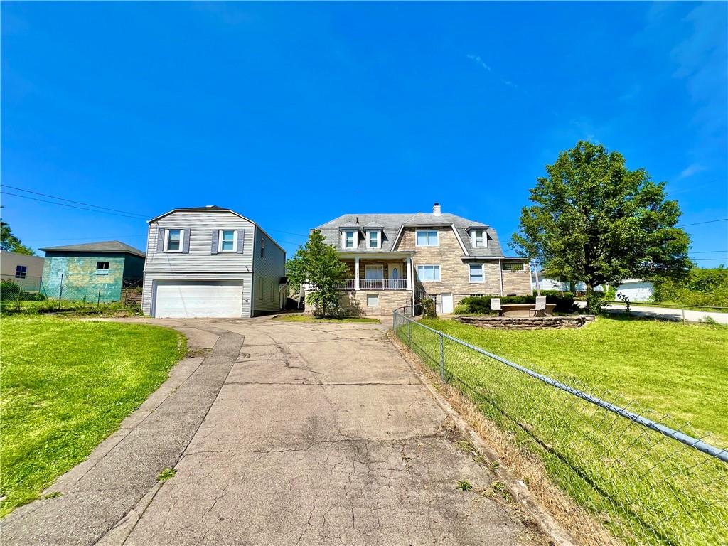 1032 Main Street Republic, PA 15475 - Photo 2 of 39 a front view of a house with garden