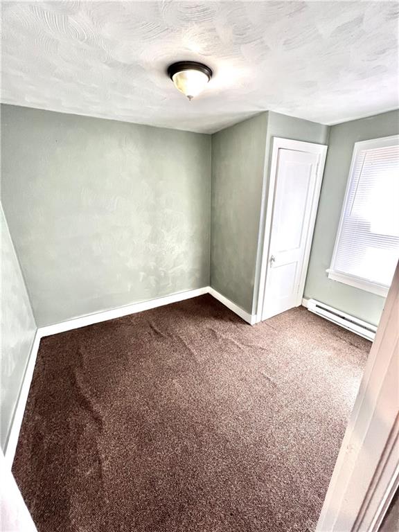 1032 Main Street Republic, PA 15475 - Photo 35 of 39 an empty room with a fireplace