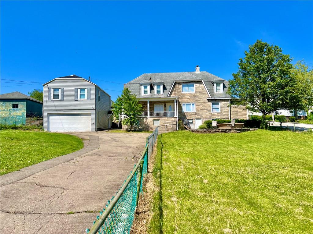 1032 Main Street Republic, PA 15475 - Photo 38 of 39 a front view of a house with a yard