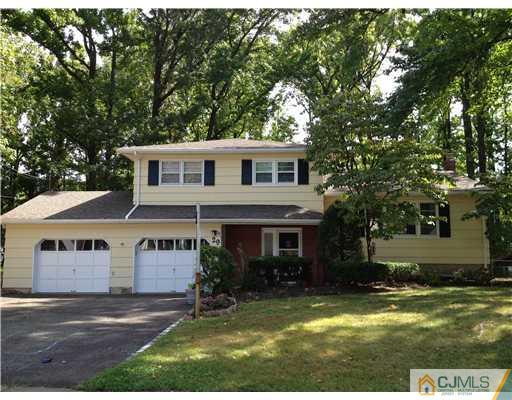 29 Sherwood Road Edison, NJ 08820 - Photo 1 of 12 a front view of house with yard and green space