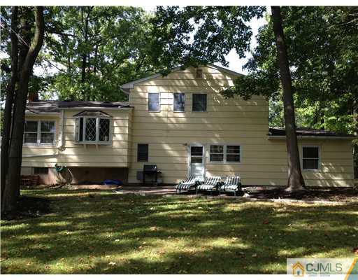 29 Sherwood Road Edison, NJ 08820 - Photo 2 of 12 a front view of house with yard