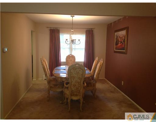 29 Sherwood Road Edison, NJ 08820 - Photo 8 of 12 a view of a dining room with furniture and window