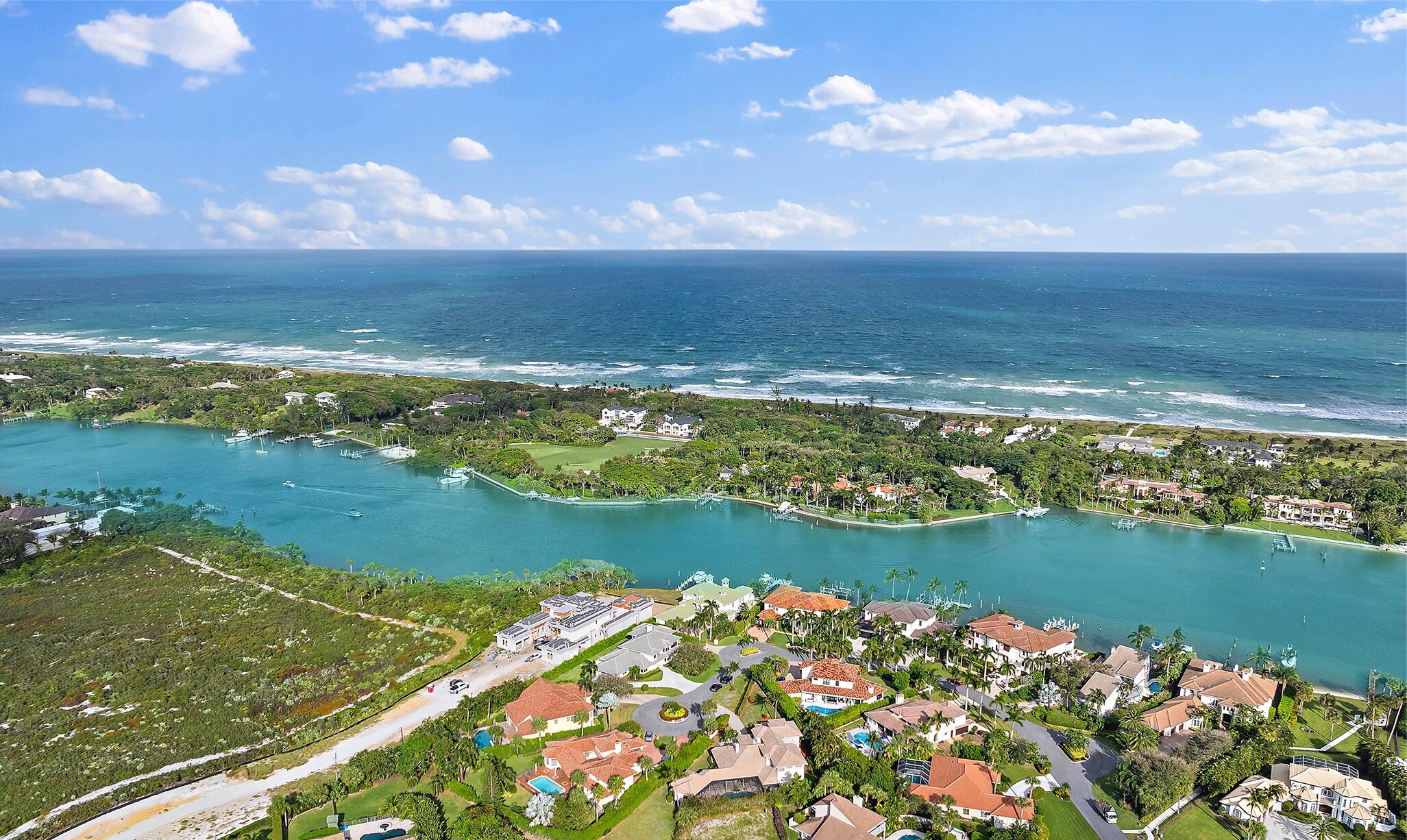 17129 Southeast Limerick Court Tequesta, FL 33469 - Photo 2 of 80 a view of an ocean and beach