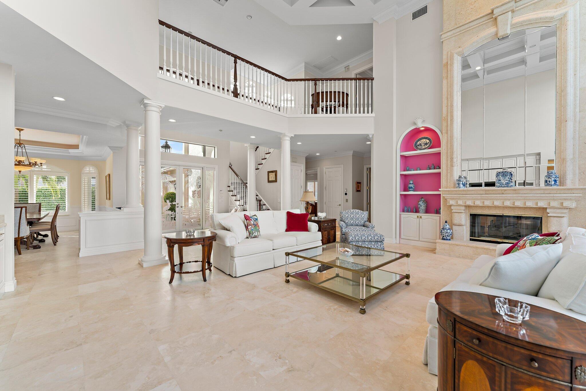 17129 Southeast Limerick Court Tequesta, FL 33469 - Photo 23 of 80 a living room with fireplace furniture and a large window