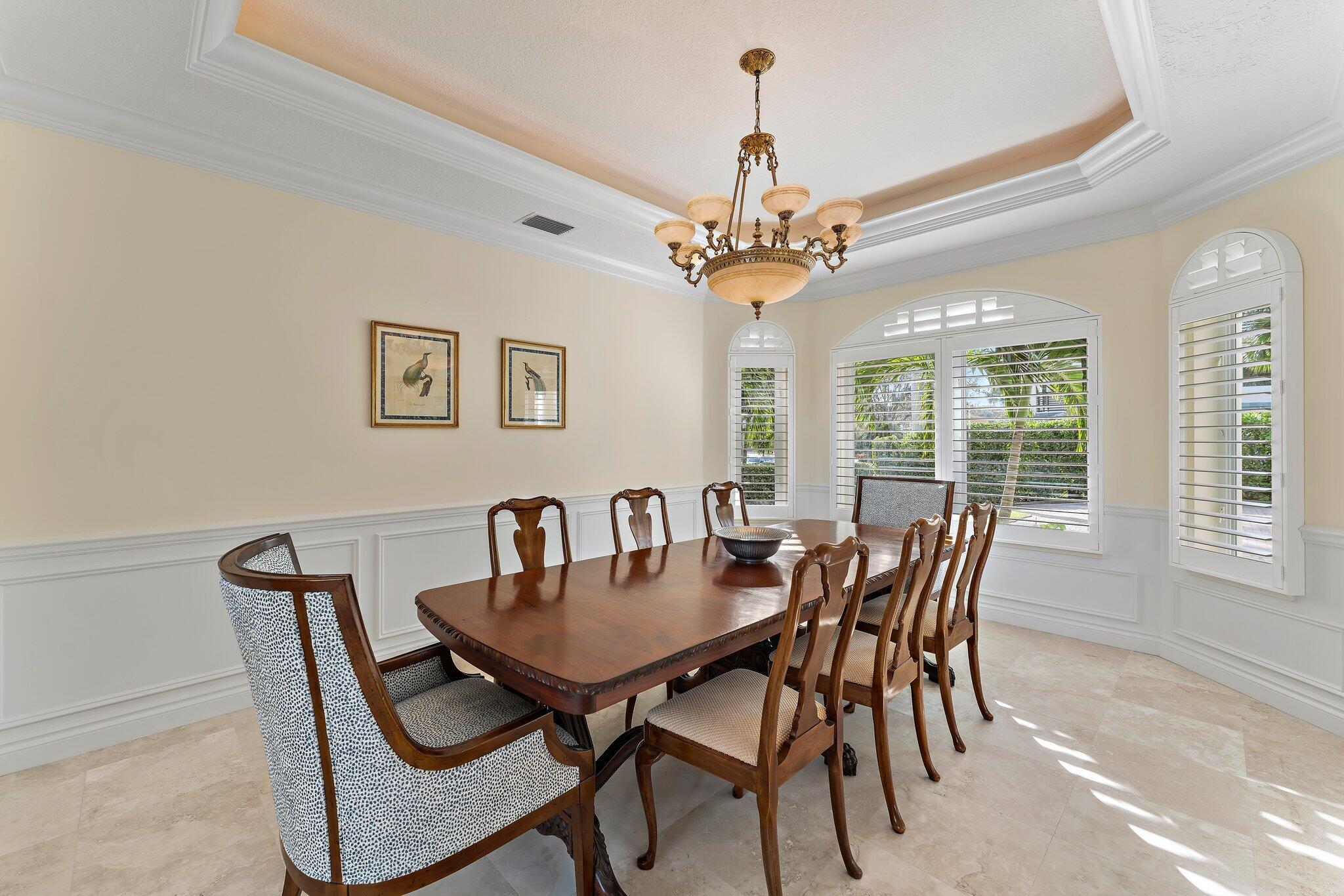 17129 Southeast Limerick Court Tequesta, FL 33469 - Photo 33 of 80 a view of a dining room with furniture window and outside view