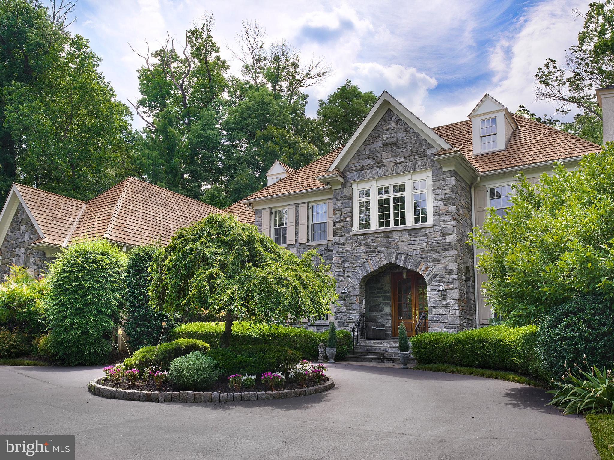 805 Montparnasse Place Newtown Square, PA 19073 - Photo 2 of 13 a front view of a house with a garden