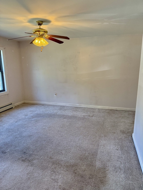 111 Hayden Street Orange, MA 01364 - Photo 13 of 26 a view of a room with wooden floor and window