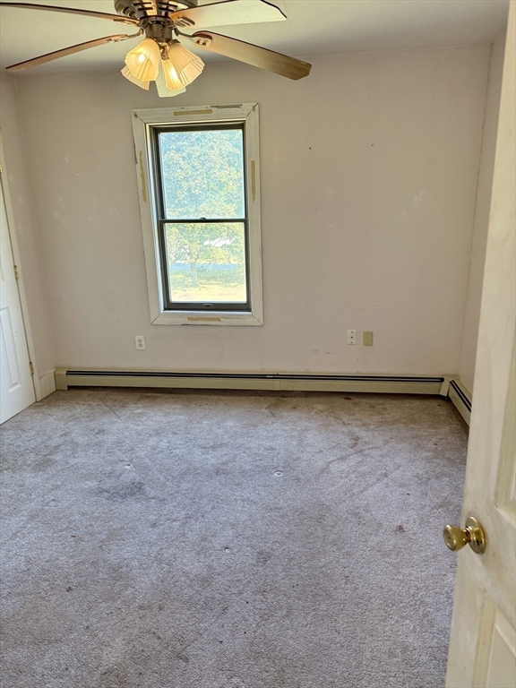 111 Hayden Street Orange, MA 01364 - Photo 17 of 26 an empty room with a window