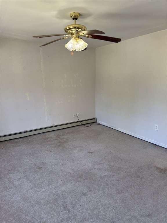 111 Hayden Street Orange, MA 01364 - Photo 20 of 26 a view of a room that has a fan