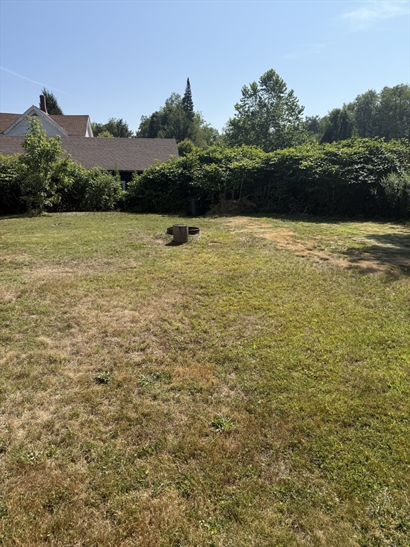 111 Hayden Street Orange, MA 01364 - Photo 7 of 26 a view of a lake with sunset