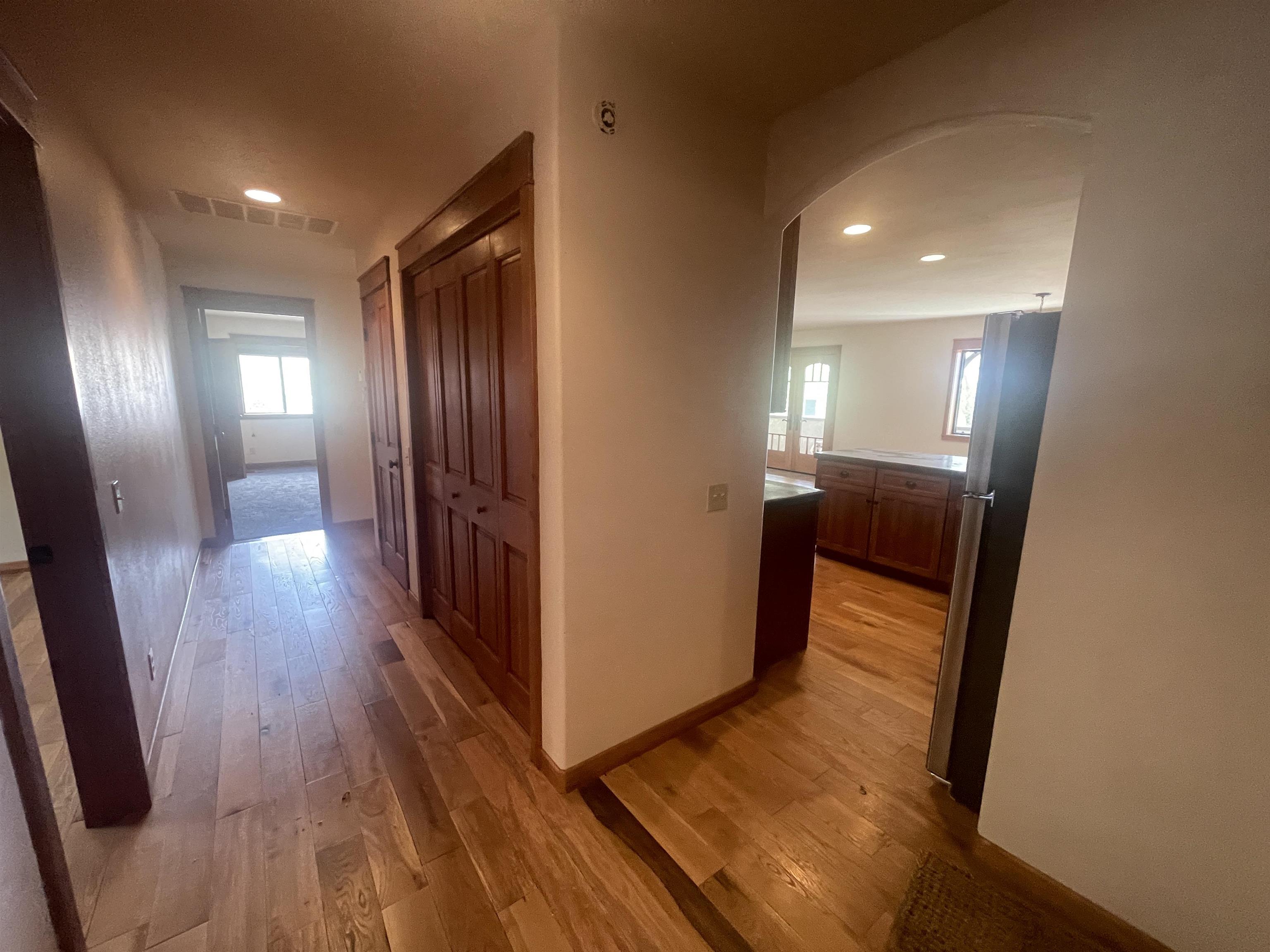 117 Summit Road, Unit 2 Bishop, CA 93514 - Photo 14 of 19 a view of a hallway with wooden floor