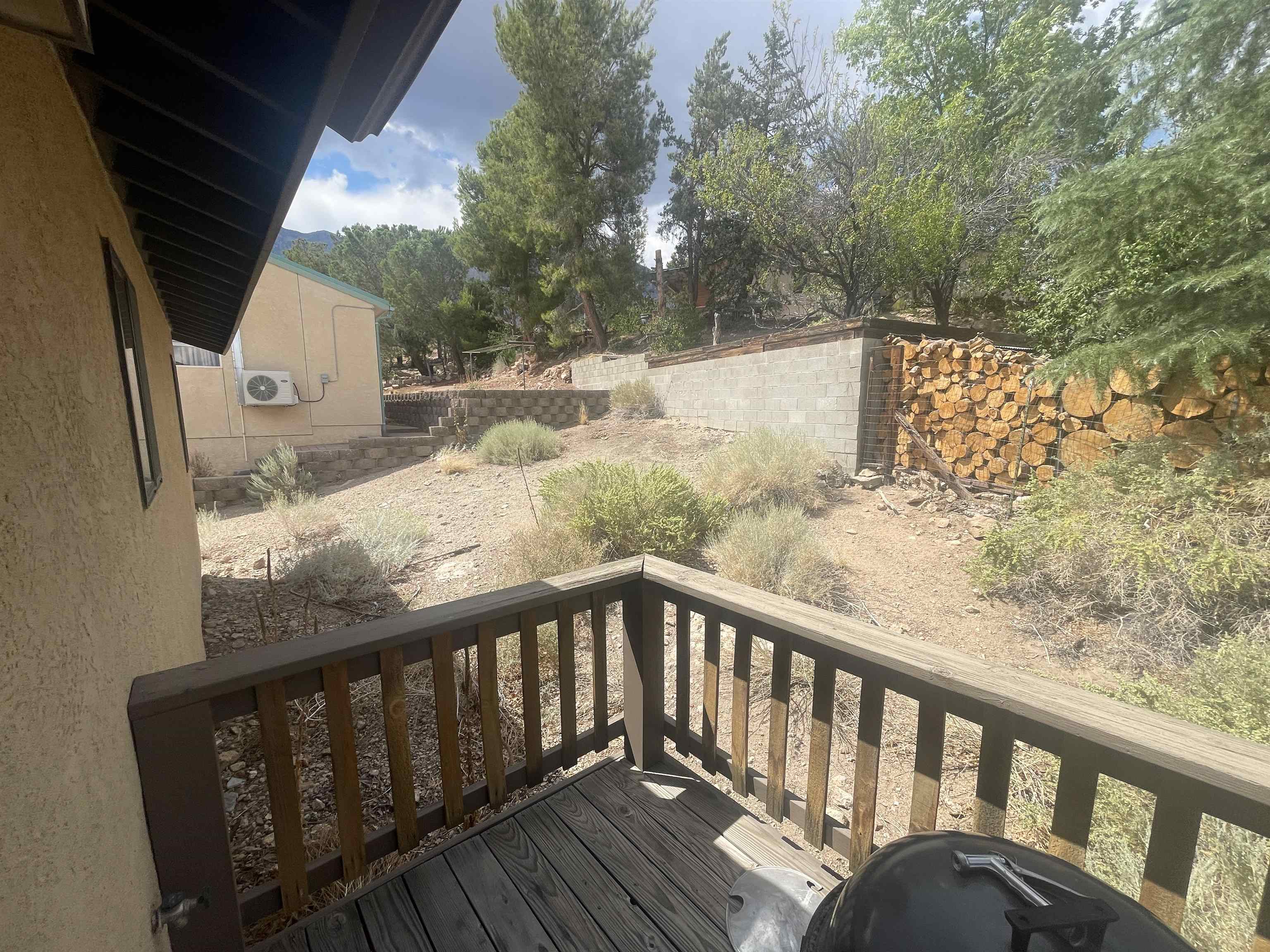 117 Summit Road, Unit 2 Bishop, CA 93514 - Photo 16 of 19 a view of a balcony with wooden fence