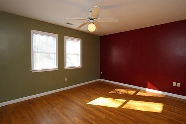 111 Silver Brook Road Milton, MA 02186 - Photo 20 of 28 a view of an empty room with wooden floor and a window