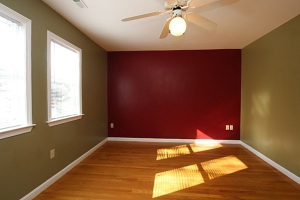 111 Silver Brook Road Milton, MA 02186 - Photo 21 of 28 a view of a room with a ceiling fan and wooden floor