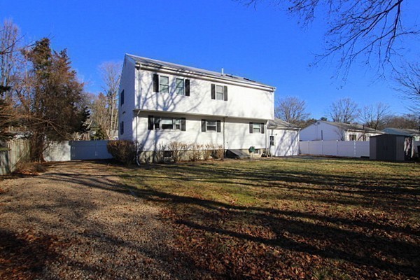 111 Silver Brook Road Milton, MA 02186 - Photo 28 of 28 a view of a house with a yard