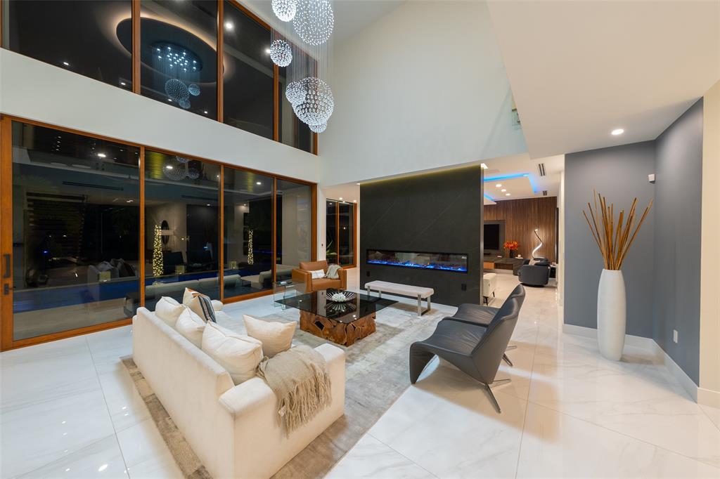 2631 Northeast 48th Court Lighthouse Point, FL 33064 - Photo 14 of 74 a living room with furniture and a flat screen tv