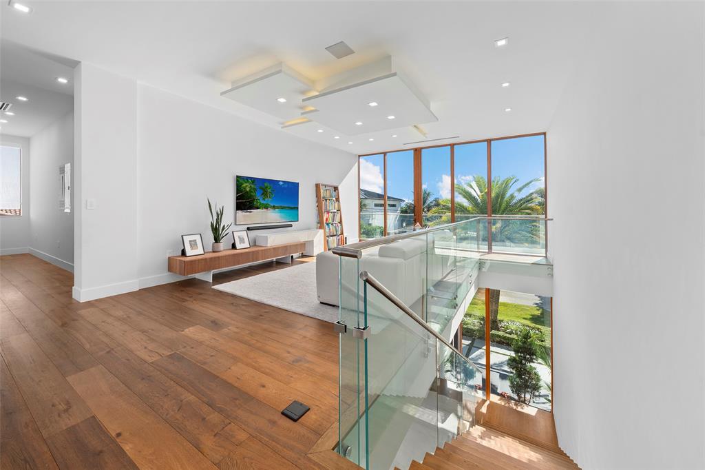 2631 Northeast 48th Court Lighthouse Point, FL 33064 - Photo 22 of 74 a living room with furniture and a flat screen tv