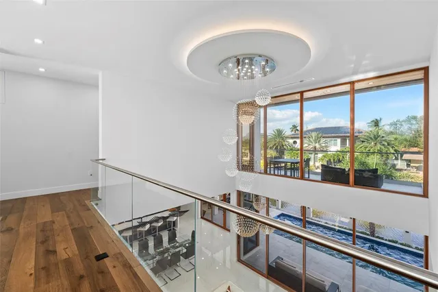a bathroom with a sink toilet a mirror and shower