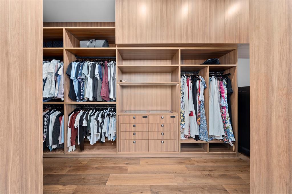 2631 Northeast 48th Court Lighthouse Point, FL 33064 - Photo 35 of 74 a view of walk in closet with clothes and shoes