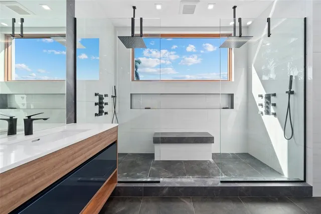 a view of a swimming pool with sitting area