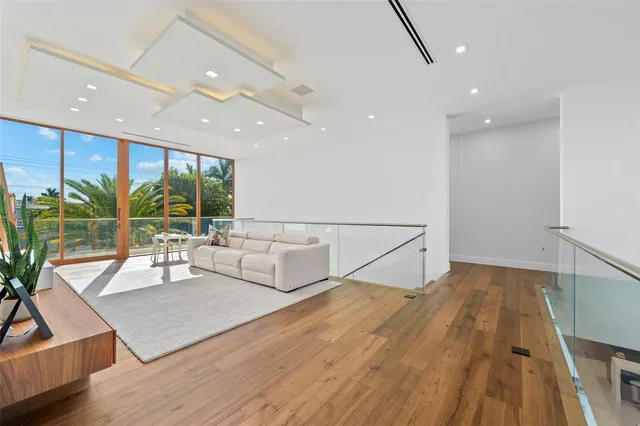 a view of swimming pool with chairs in patio