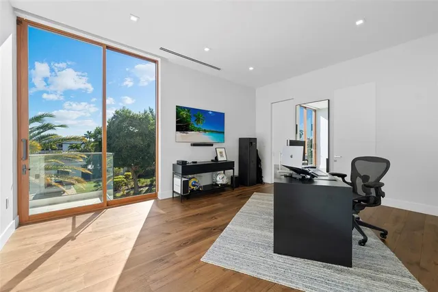 an aerial view of a house with outdoor space swimming pool and outdoor seating