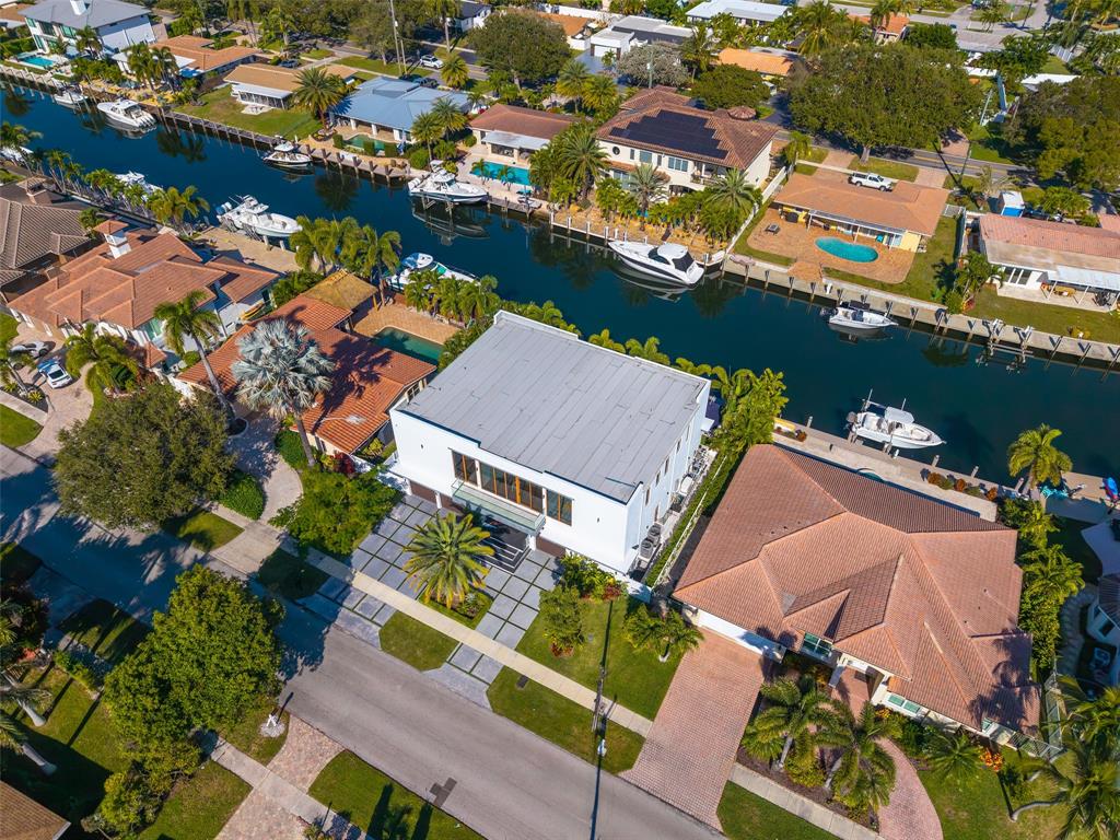 2631 Northeast 48th Court Lighthouse Point, FL 33064 - Photo 70 of 74 an aerial view of residential houses with outdoor space