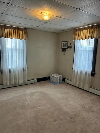 an empty room with windows
