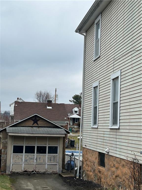 419 Indiana Avenue Monessen, PA 15062 - Photo 19 of 19 a front view of a house with a garage