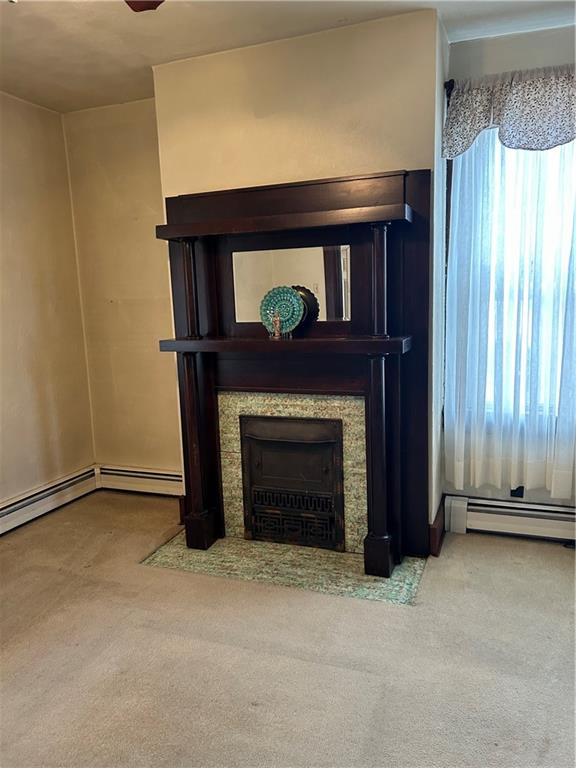 419 Indiana Avenue Monessen, PA 15062 - Photo 5 of 19 a living room with furniture and a fireplace