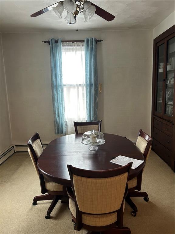 419 Indiana Avenue Monessen, PA 15062 - Photo 6 of 19 a view of a dining room with a table and chairs