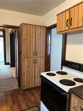 a kitchen with stainless steel appliances a stove and a refrigerator