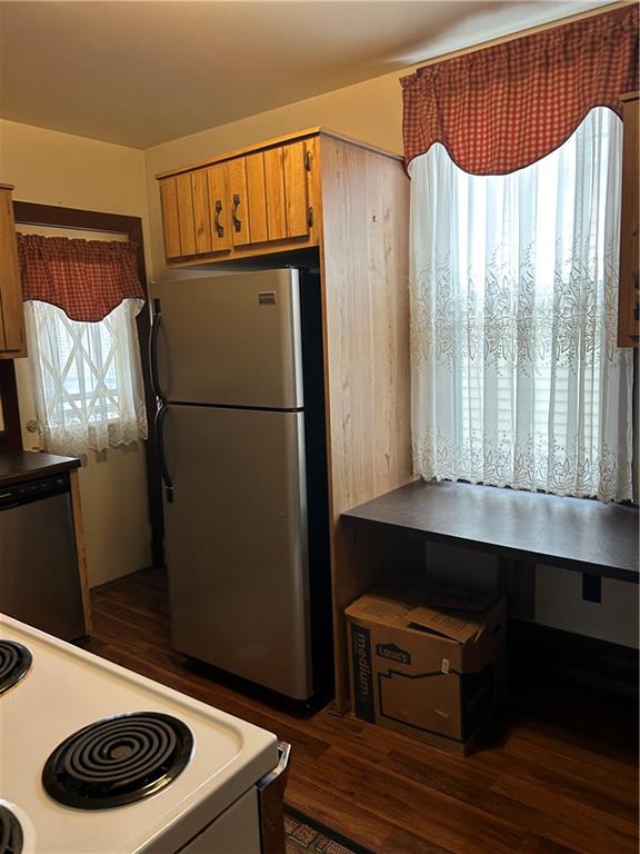 419 Indiana Avenue Monessen, PA 15062 - Photo 10 of 19 a kitchen with a refrigerator and a window