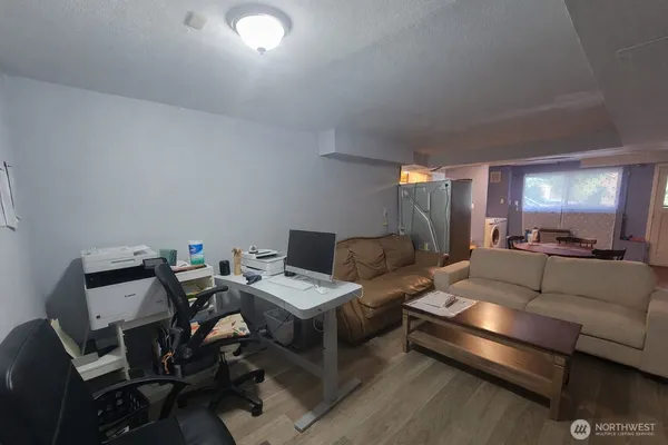 a kitchen with a sink and a large window