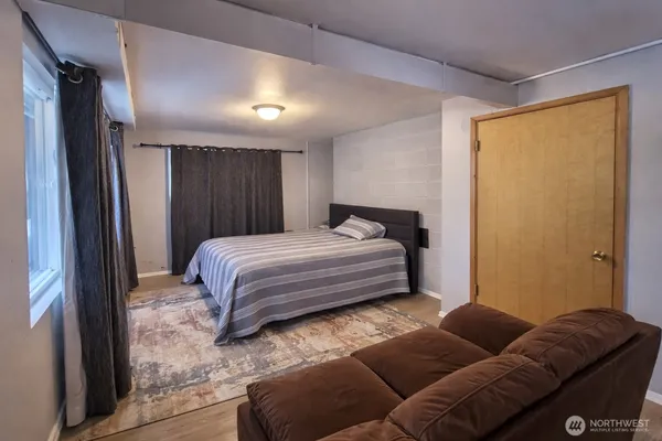 a view of a storage & utility room with washer and dryer