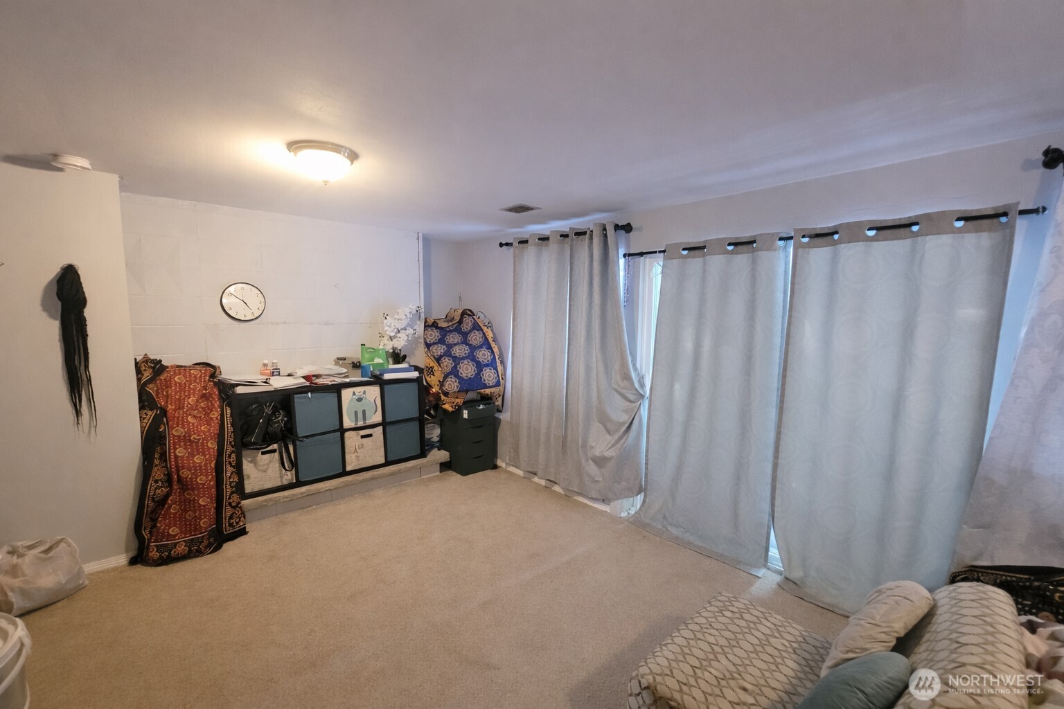 14600 Southeast 181st Street Renton, WA 98058 - Photo 19 of 39 a bed room with a bed and a chair