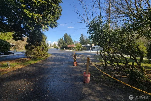 a view of street with parked cars