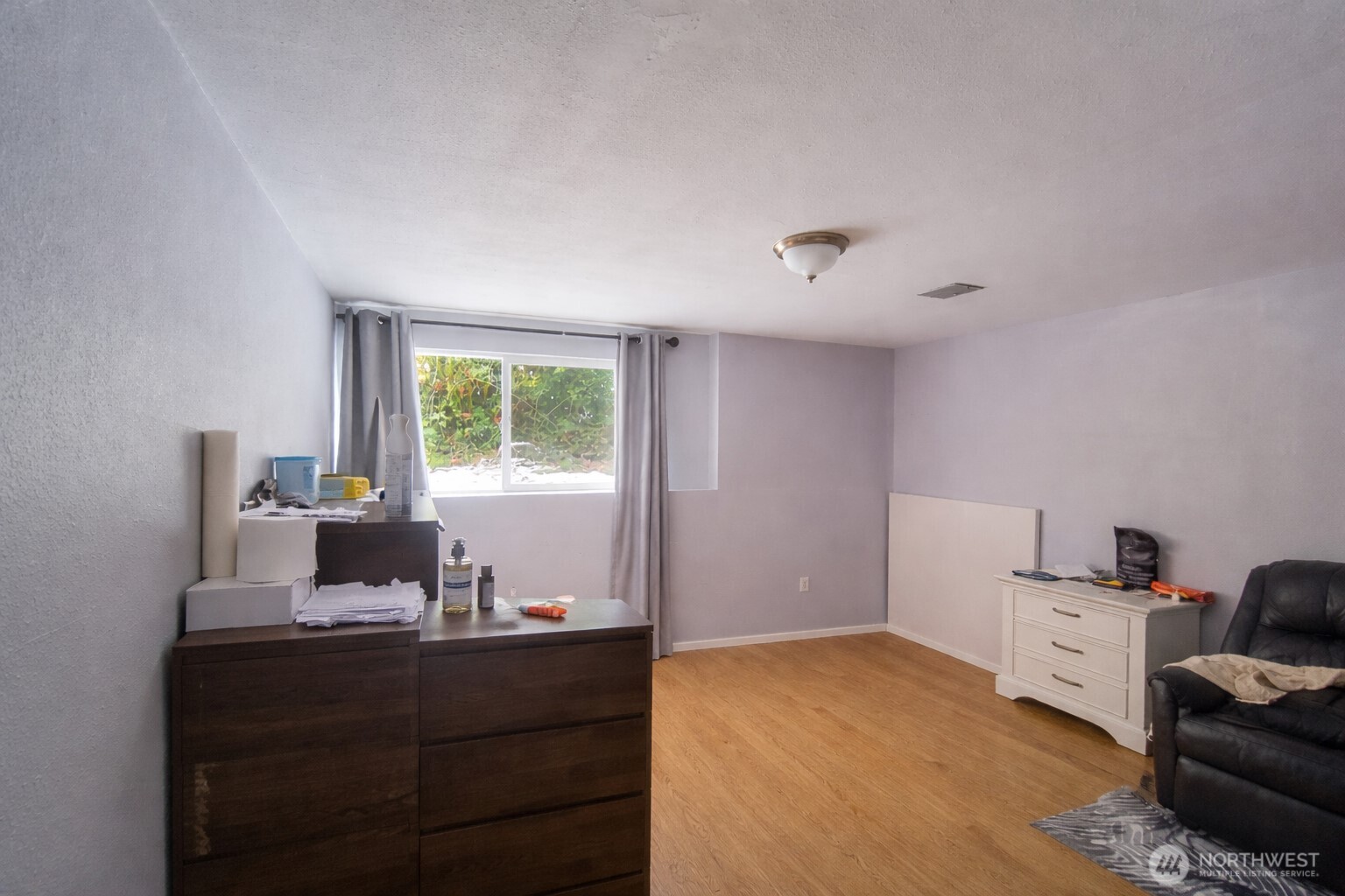 14600 Southeast 181st Street Renton, WA 98058 - Photo 23 of 39 a bedroom with a bed and a window