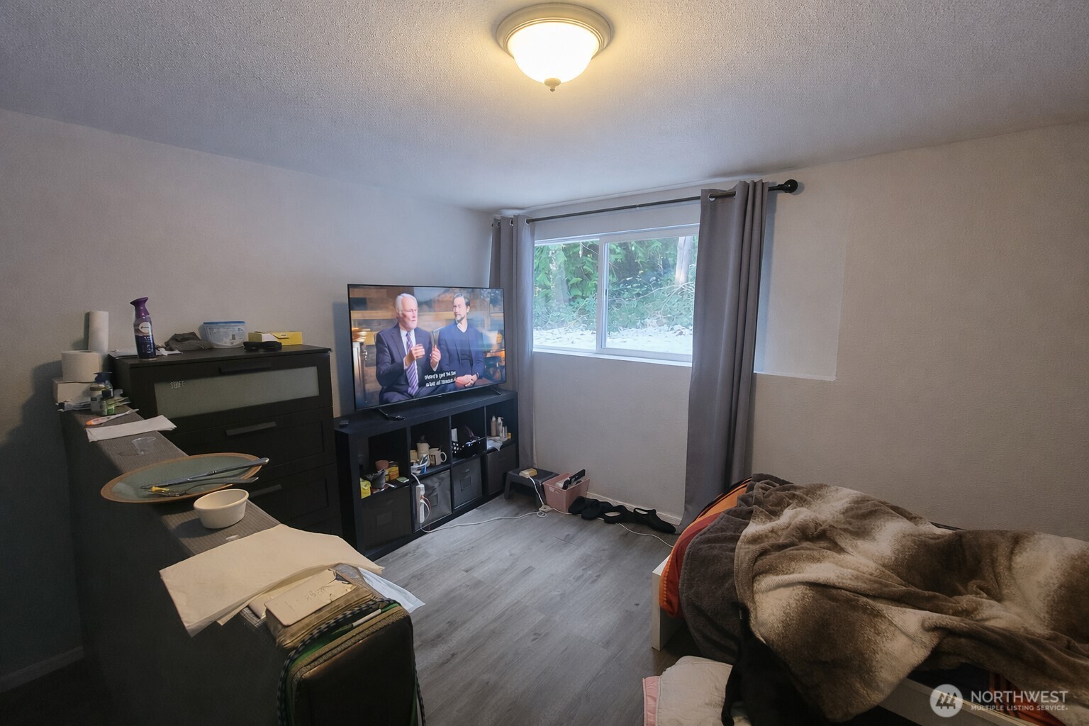 14600 Southeast 181st Street Renton, WA 98058 - Photo 25 of 39 a living room with furniture and a flat screen tv