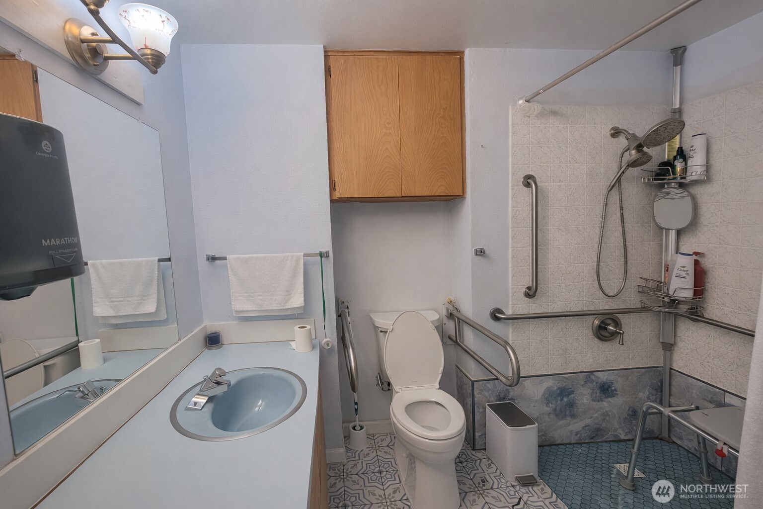 14600 Southeast 181st Street Renton, WA 98058 - Photo 31 of 39 a bathroom with a granite countertop toilet sink and mirror