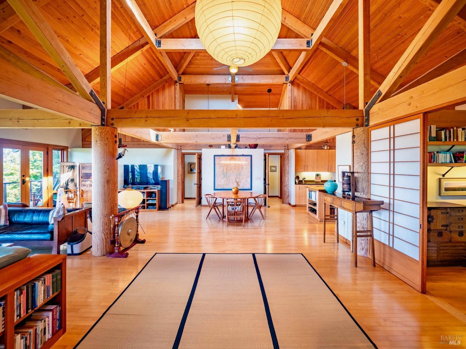 10951 Big Meadow Road Philo, CA 95466 - Photo 2 of 46 Step inside the light-filled, elegant interior and you’ll find soaring vaulted combed spruce ceilings and other exquisite wood features.