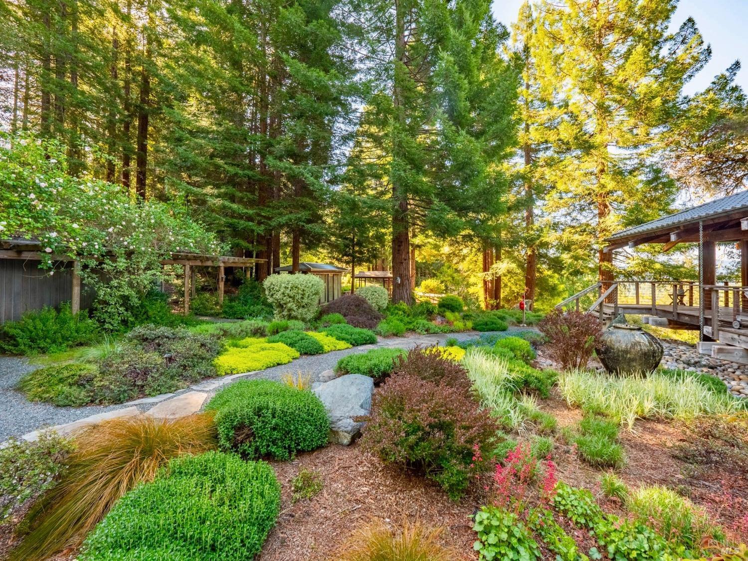 10951 Big Meadow Road Philo, CA 95466 - Photo 29 of 46 Meticulous landscaping has sculpted separate garden sanctuaries, each with its own exquisite charm. Antique roses draped over trellises delight the senses.
