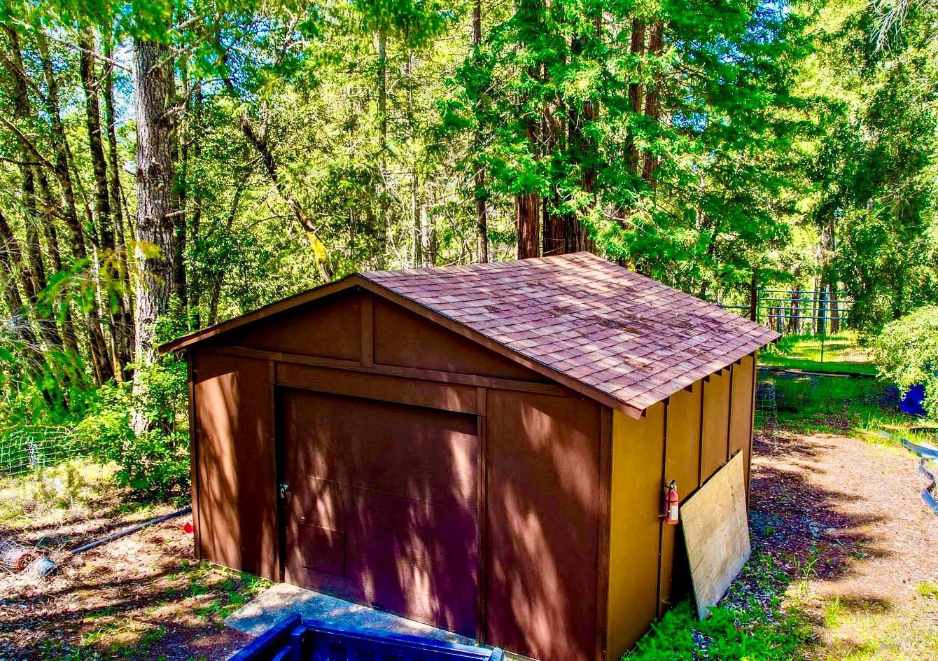 10951 Big Meadow Road Philo, CA 95466 - Photo 46 of 46 Located near the Yurt, this single car garage/outbuilding serve a storage space.