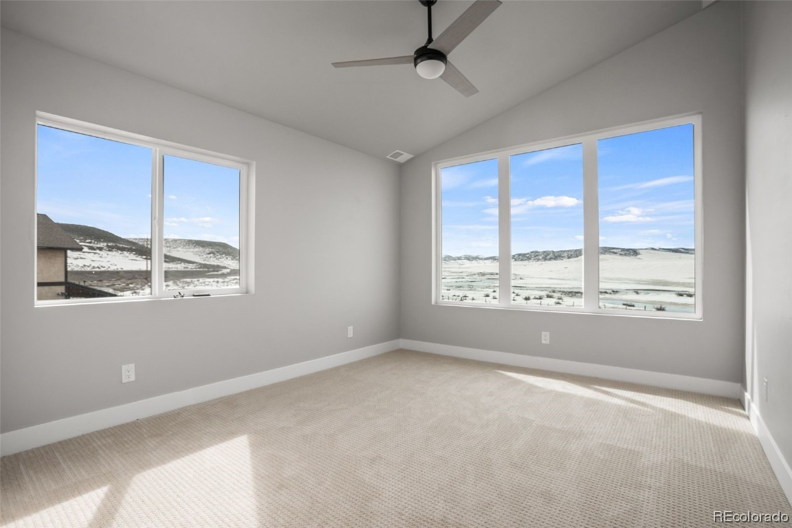 932 Dry Creek Road Hayden, CO 81639 - Photo 13 of 24 a view of an empty room with a window