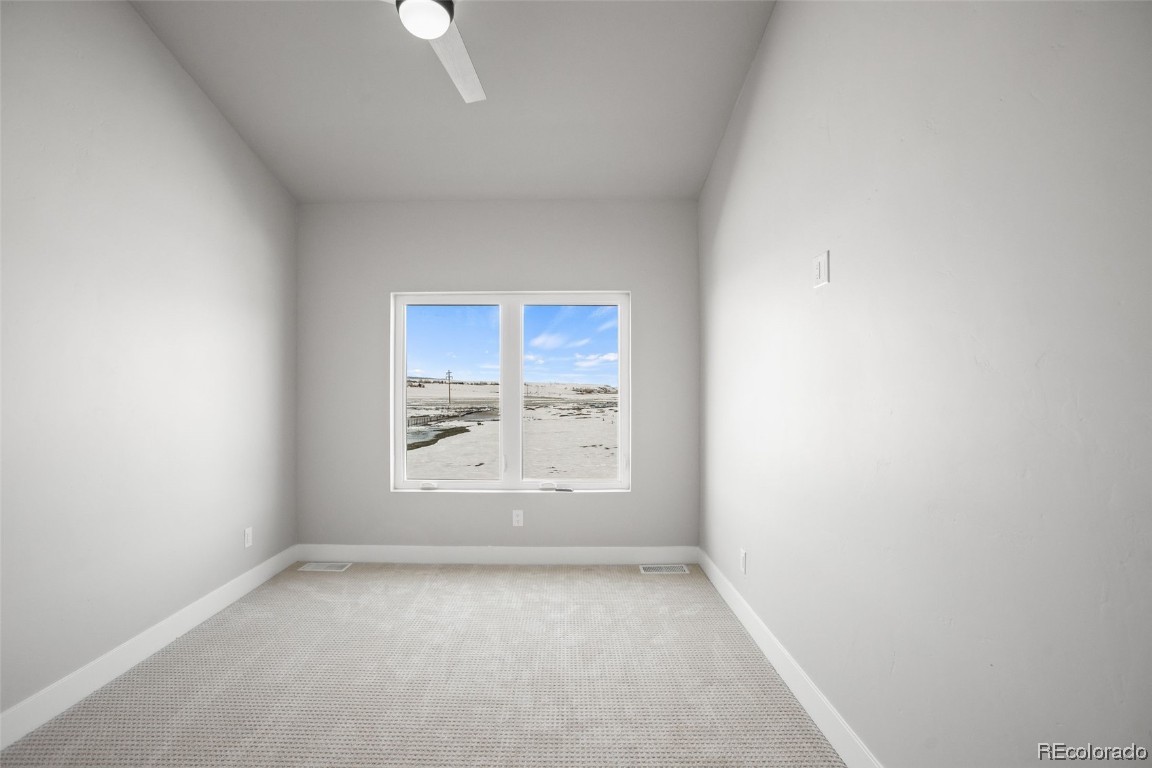 932 Dry Creek Road Hayden, CO 81639 - Photo 15 of 24 an empty room with a window