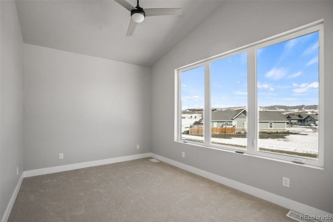 932 Dry Creek Road Hayden, CO 81639 - Photo 17 of 24 an empty room with a window