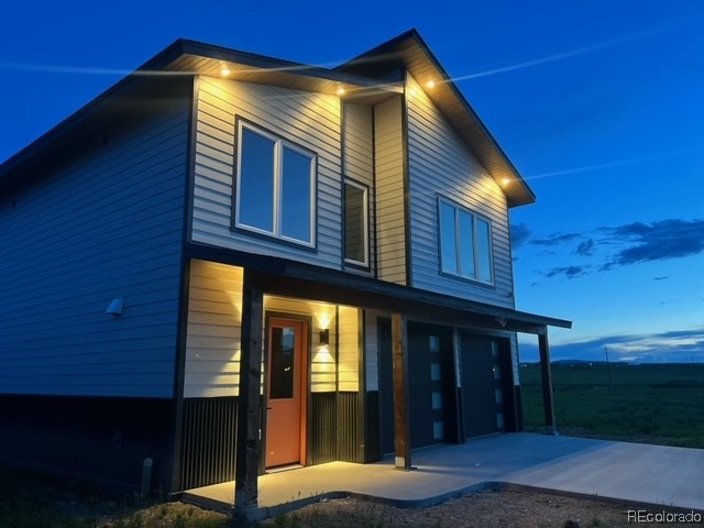 932 Dry Creek Road Hayden, CO 81639 - Photo 2 of 24 a view of house with a outdoor space