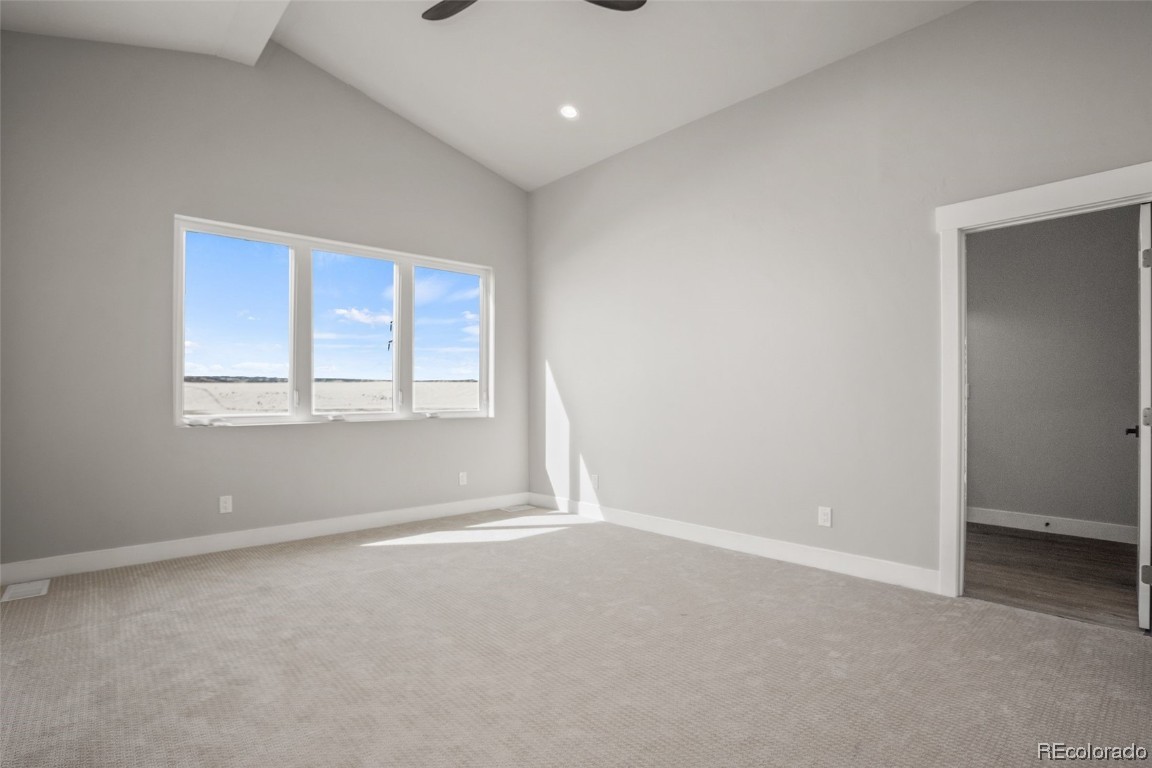 932 Dry Creek Road Hayden, CO 81639 - Photo 9 of 24 an empty room with windows and closet