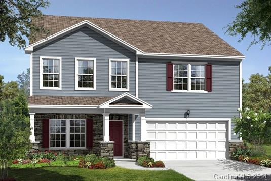 79457 Ridgehaven Road, Unit 40 Lancaster, SC 29720 - Photo 1 of 1 a front view of a house with garden
